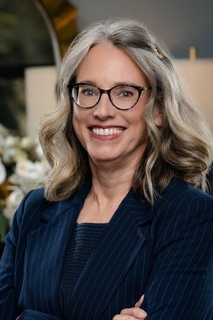 Professional headshot of Sarah Blakeman, Director of First Impressions at Retirement Investment Advisors, Inc.