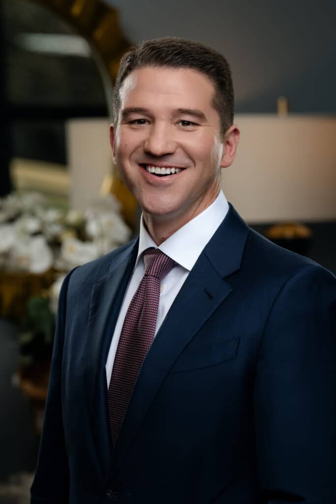 Professional headshot of Andrew Flinton, President and Managing Partner at Retirement Investment Advisors, Inc.