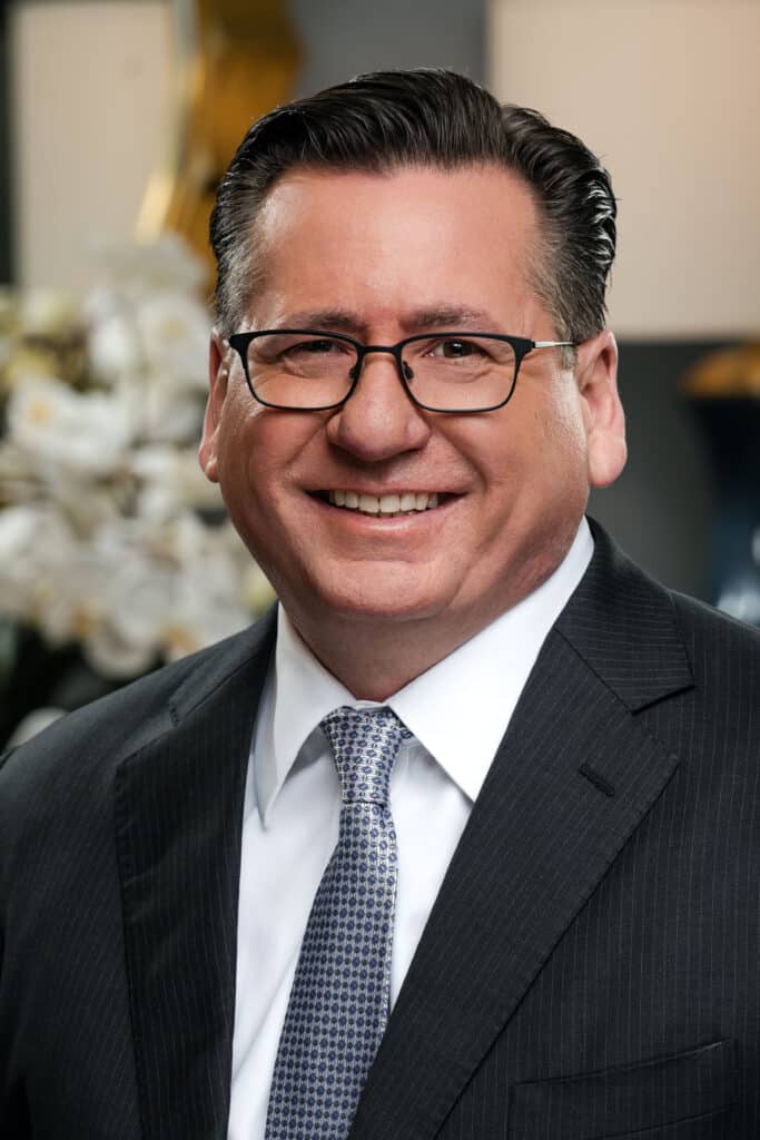 Professional headshot of Chad A. Rudy, Executive Vice President - Texas at Retirement Investment Advisors, Inc.