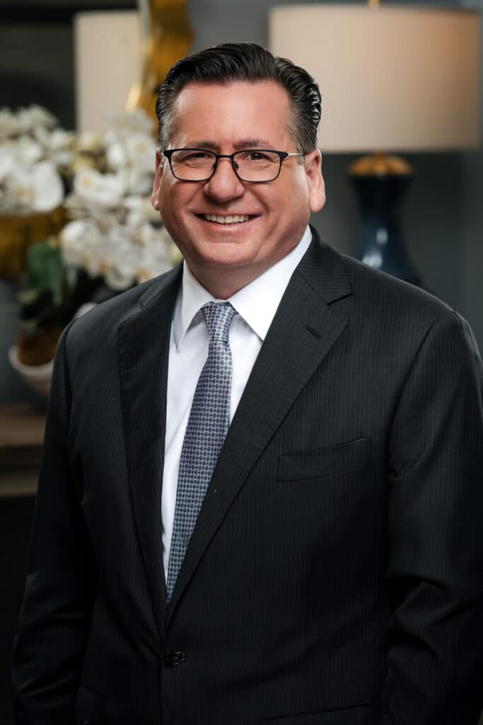 Professional headshot of Chad Rudy, Executive Vice President - Texas at Retirement Investment Advisors, Inc.